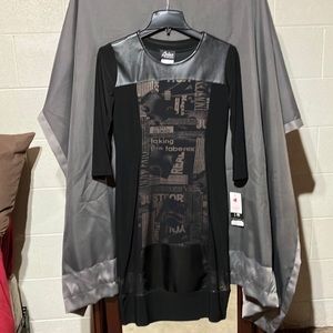 Artex Fashions. Shift dress, faux leather detailing and fun panel design.